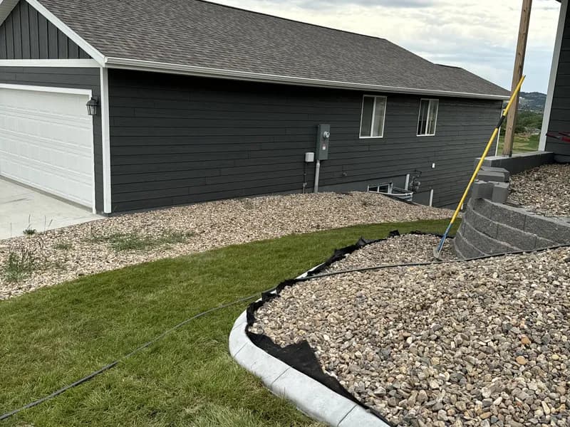 Decorative concrete curbing along a side yard in Rapid City SD