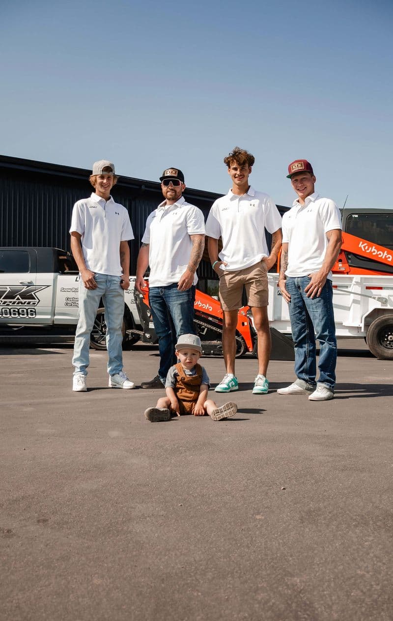 ATK Landscaping team with trucks and equipment in Rapid City, South Dakota